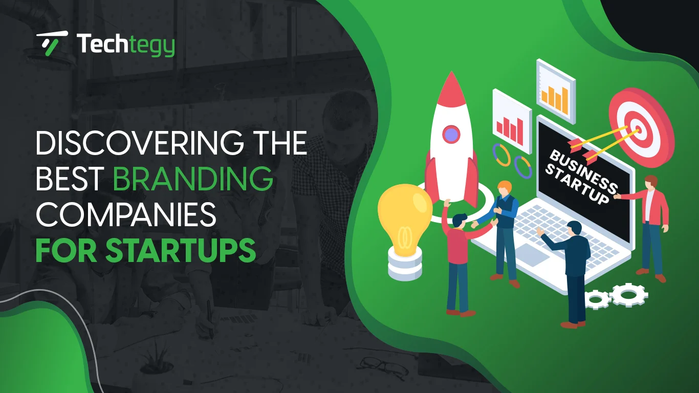 Laptop open to list of the best branding companies for startups including their logos, services, and packages.